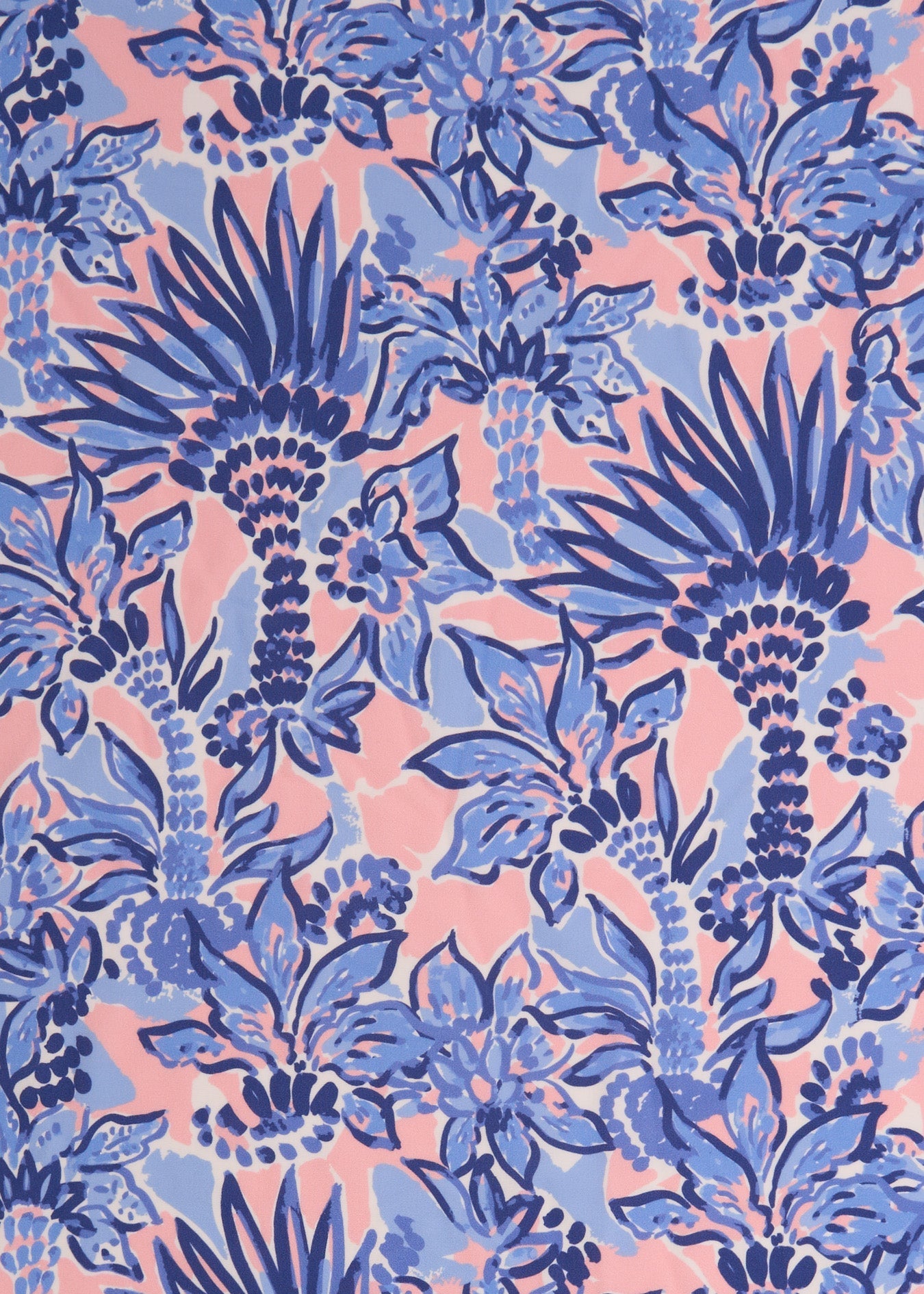 A close up of the UPF 50+ palm print fabric on the Cabana Life Palm Beach Sleeveless Tunic Dress.