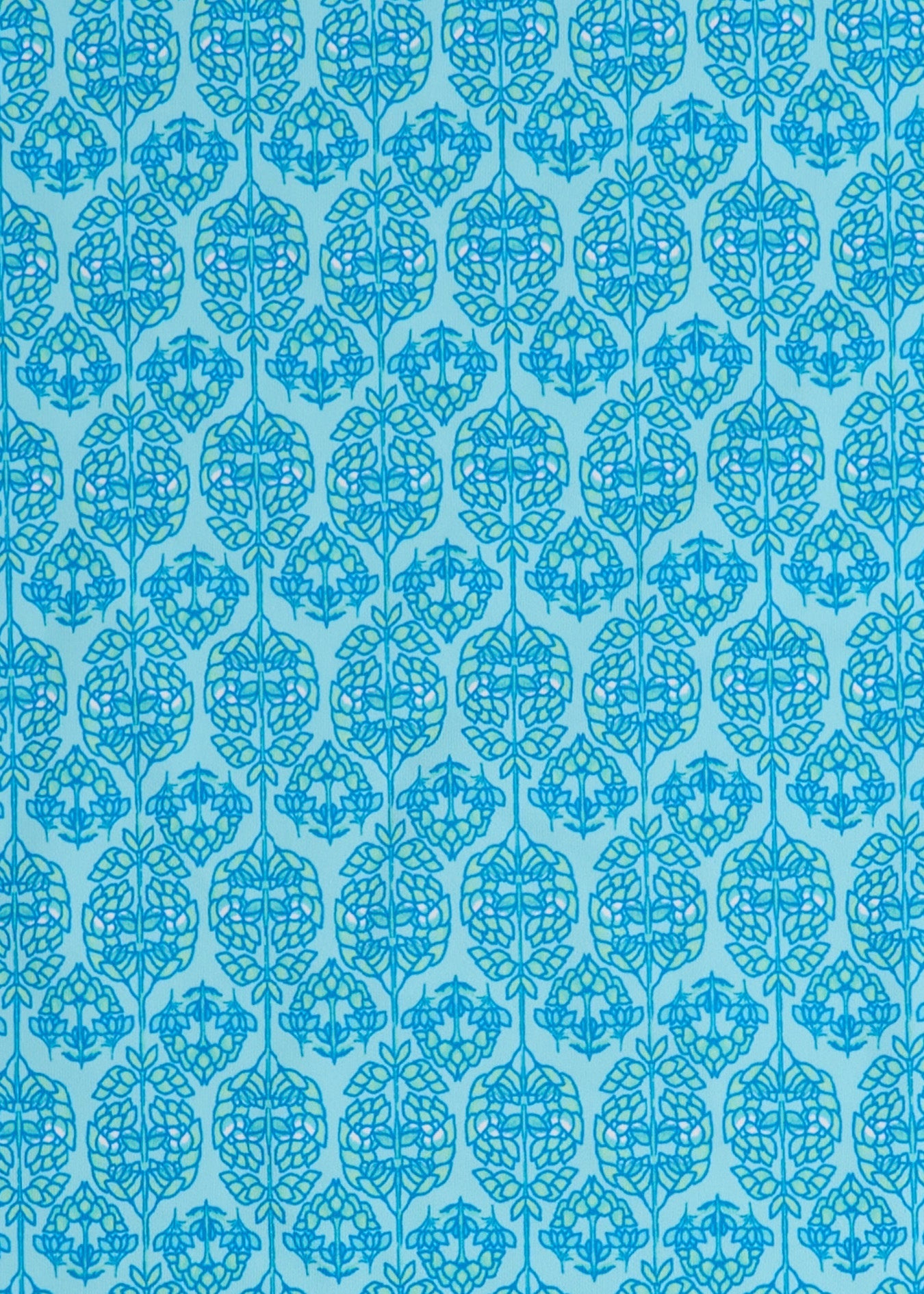 A close up of the UPF 50+ blue printed woven fabric on the Cabana Life Rosemary Beach Relaxed Dress.