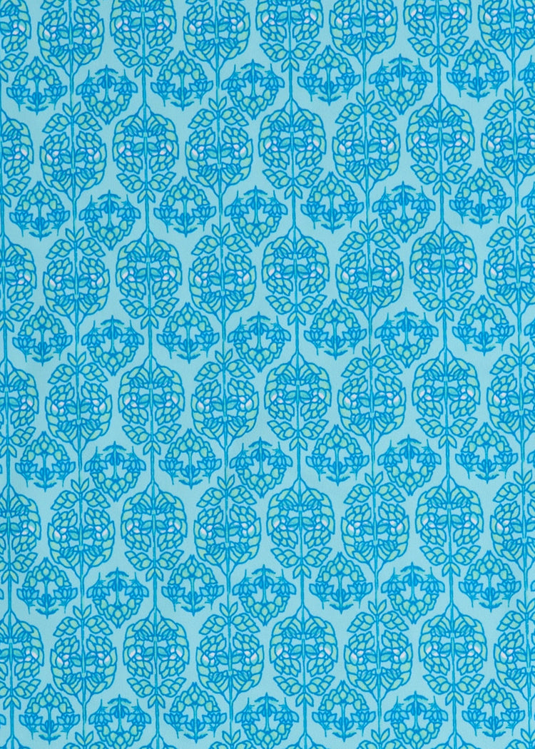 A close up of the UPF 50+ blue printed woven fabric on the Cabana Life Rosemary Beach Relaxed Dress.