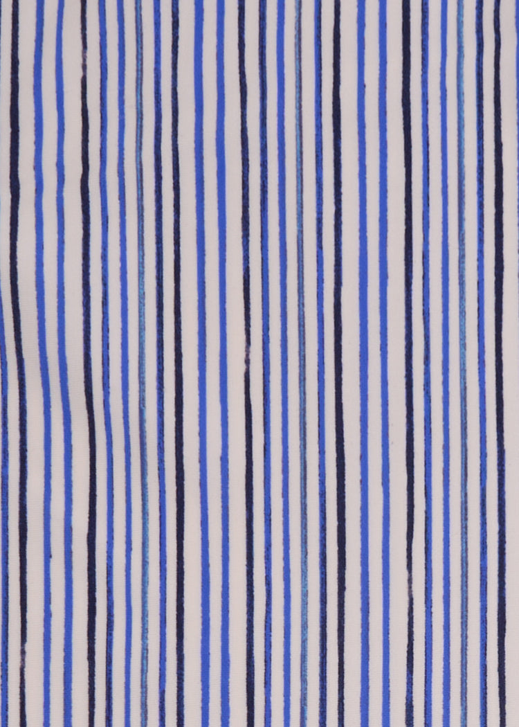 A close up of Cabana Life's Seaside blue and dark navy striped print on a UPF 50+ fabric. 