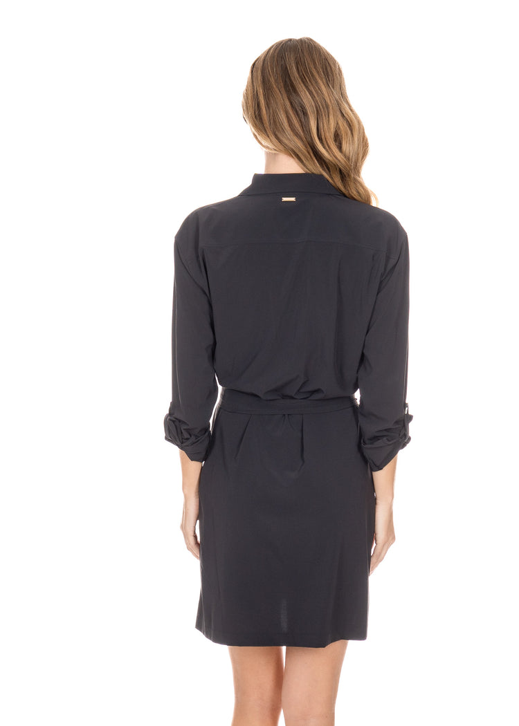 Back facing blonde woman wearing the Black Button Down Shirt Dress.