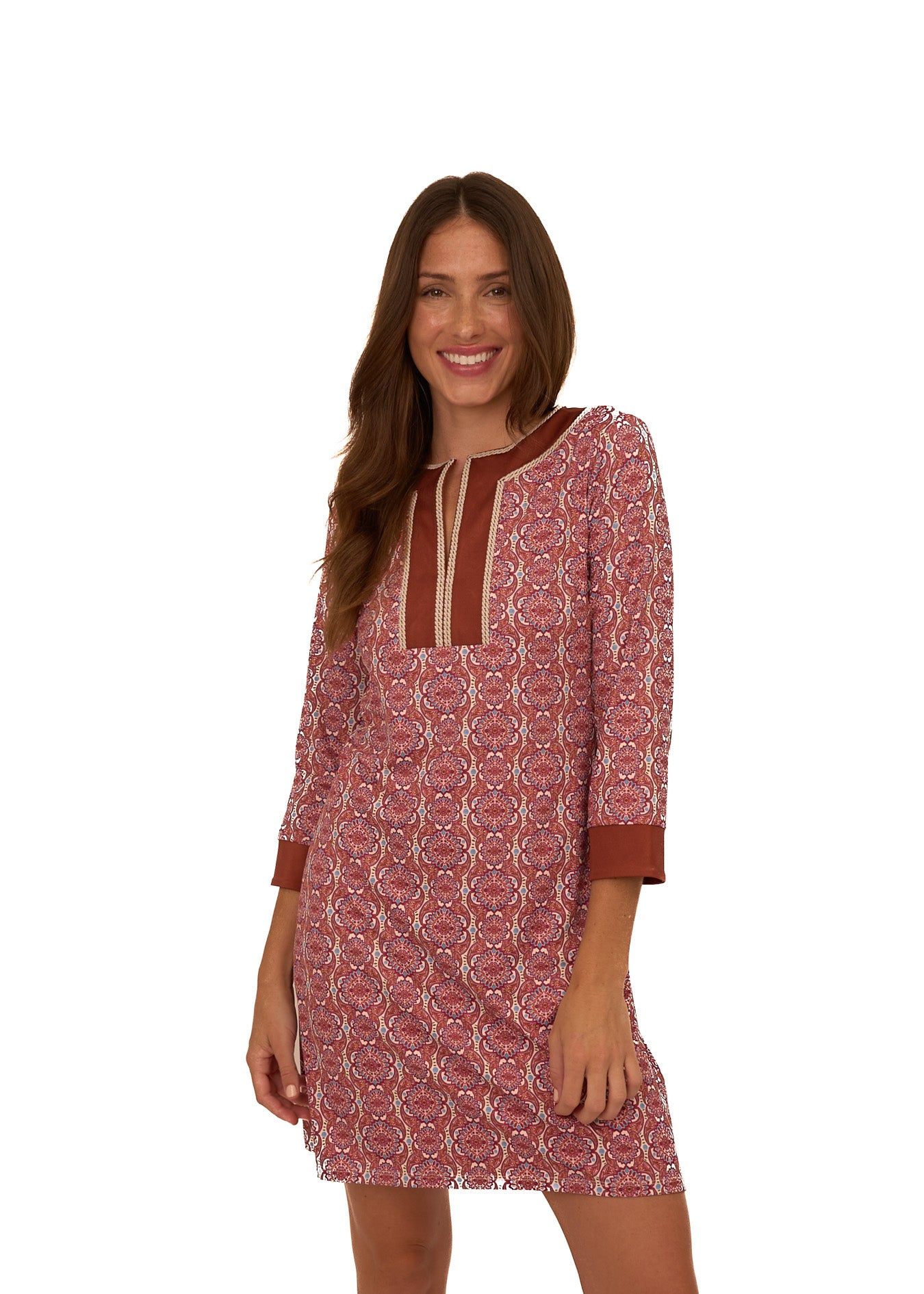 A brunette woman wearing Cabana Life's sun protective Camden Geo Embroidered Tunic Dress on a white background.