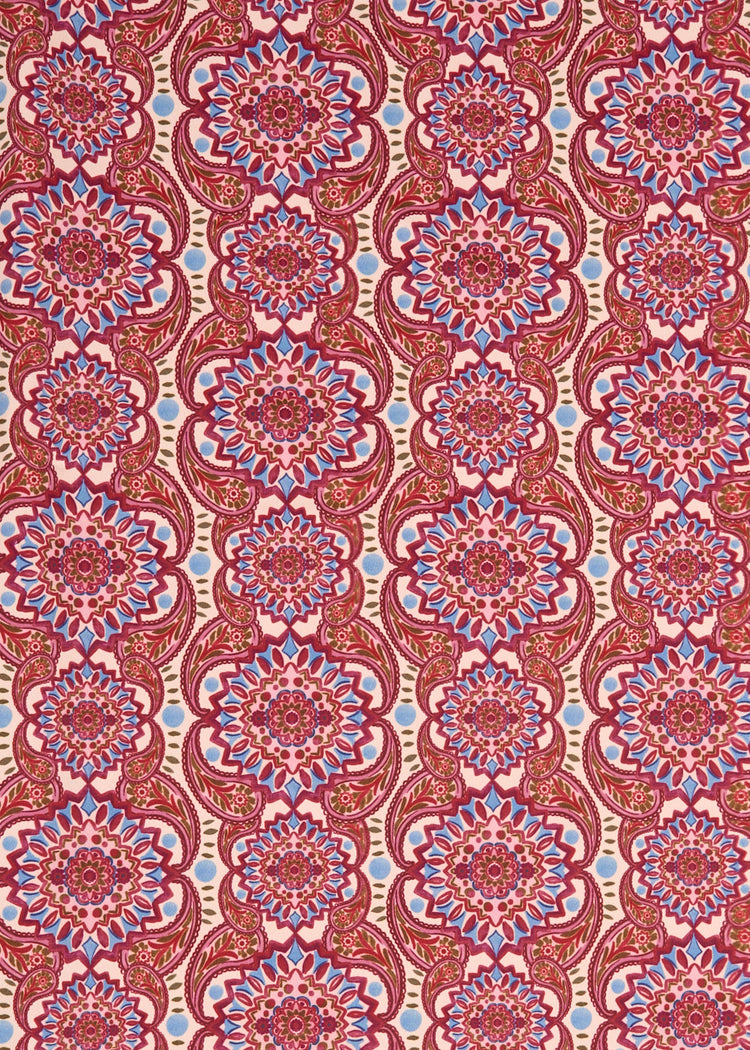 A close up of Cabana Life's sun protective red Camden Geo printed fabric.