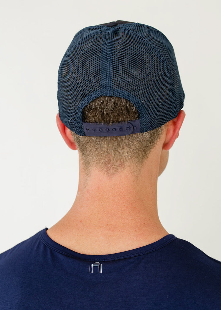 The back of a man wearing Cabana Life's sun safe Cabana Boy Hat.