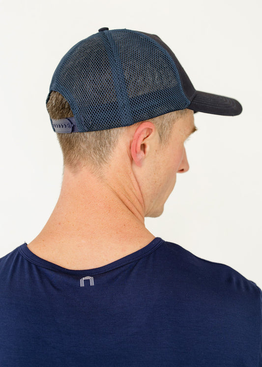 The side of a man's head wearing Cabana Life's sun safe Cabana Boy Hat.