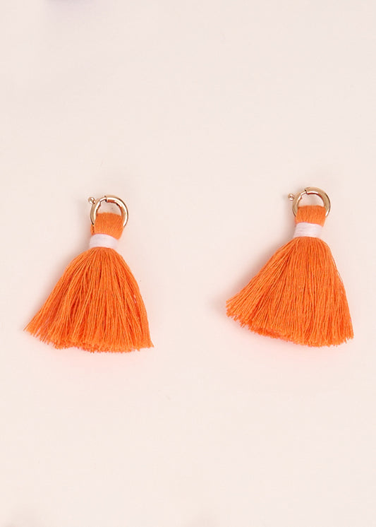 Cabana Life's Orange Game Day Tassel Set on a white background.