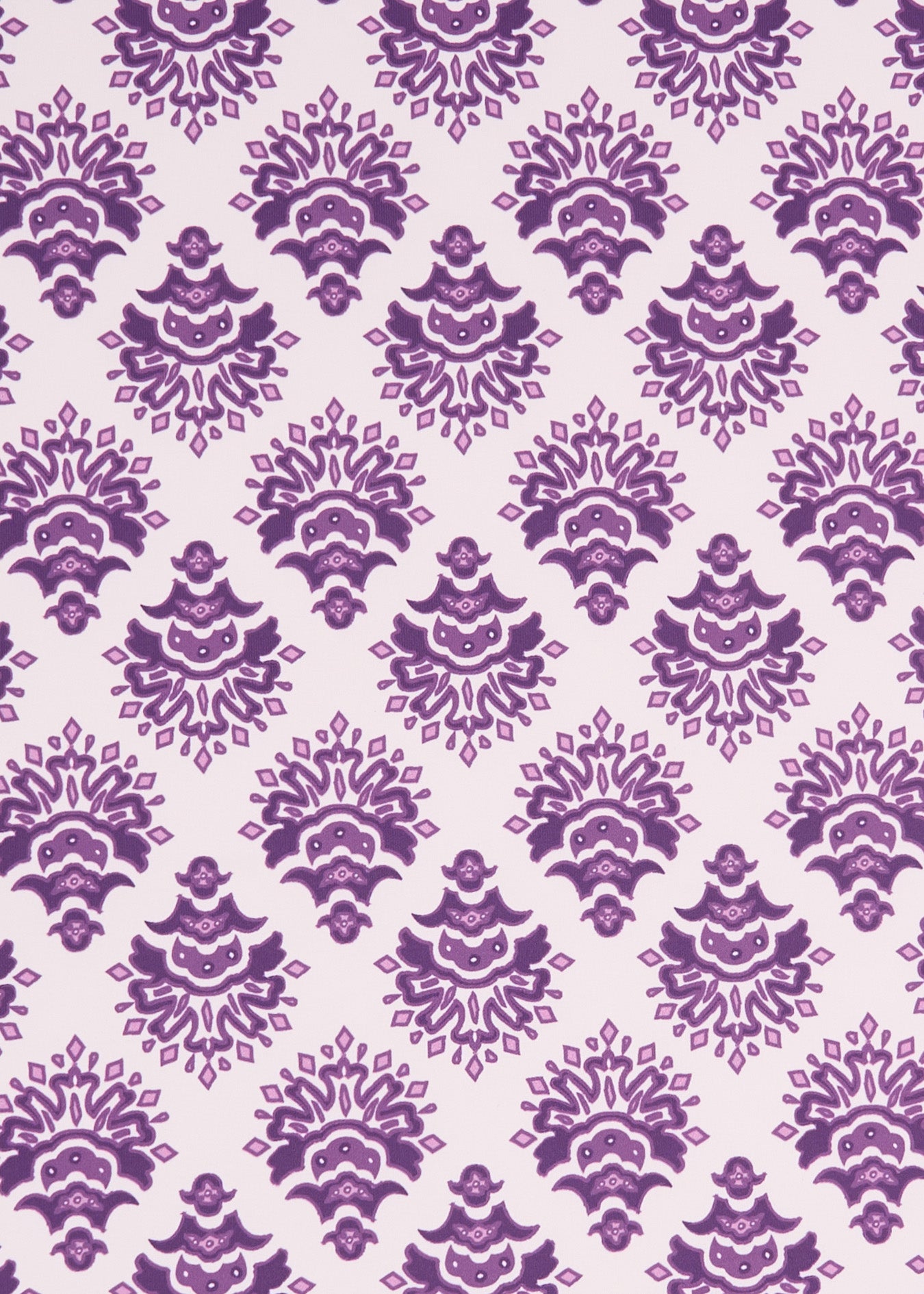 A close up of a purple and white Cabana Life print on sun protective fabric.