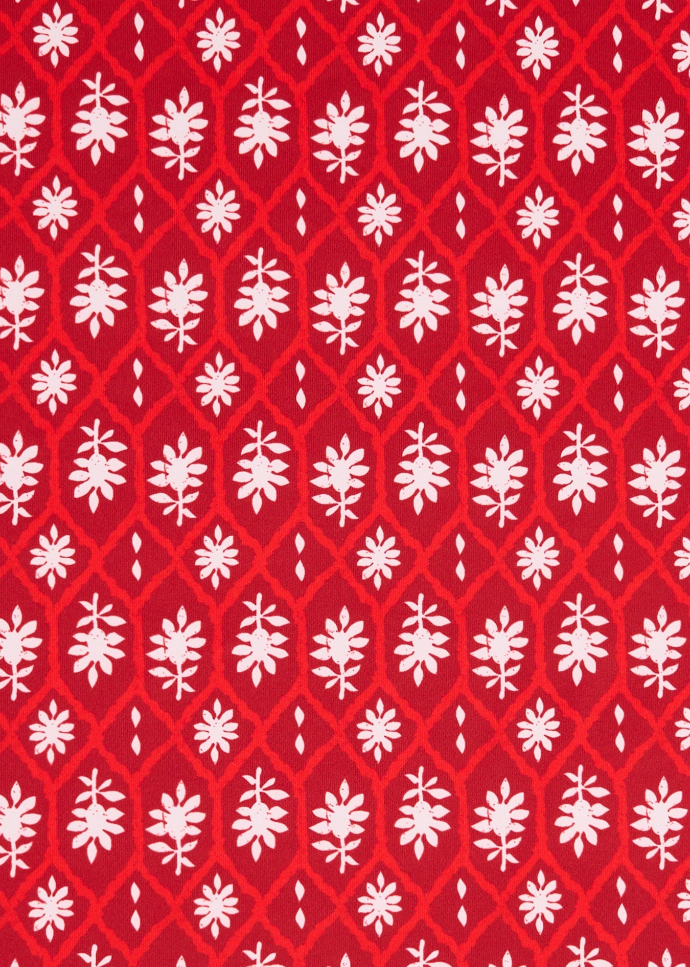 A crimson, red and white Cabana Life print on a sun protective fabric.