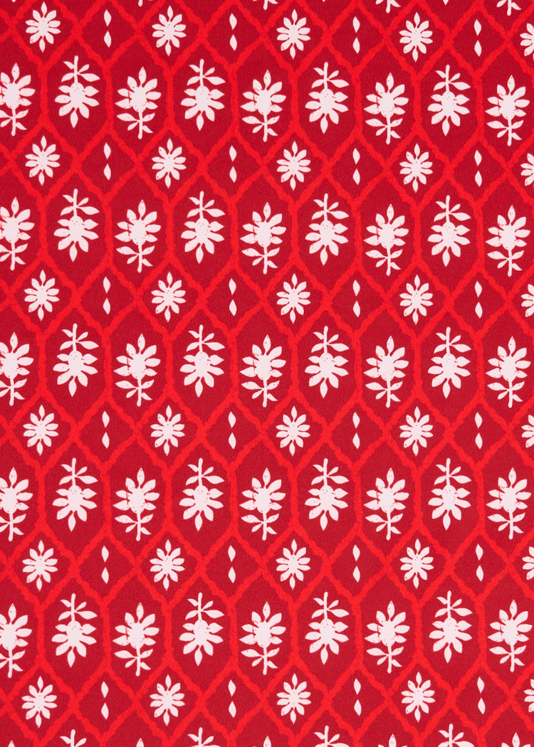 A crimson, red and white Cabana Life print on a sun protective fabric.