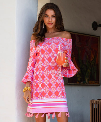 Woman wearing Cabana Life sun protective special occasion dress.