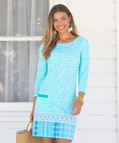 Two women wearing Cabana Life sun protective Coastal Cottage Cabana Shift Dress.