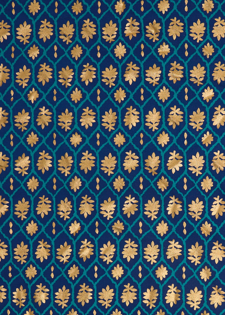 A close up of the navy and gold printed Cabana Life sun protective fabric.